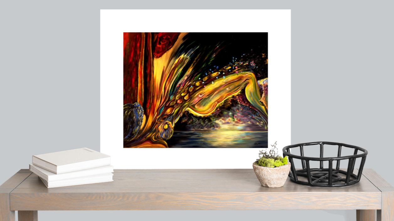 Framed abstract painting on a table with books, a plant, and a basket.