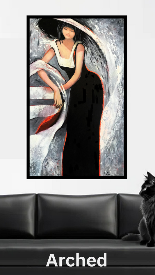 Framed figurativet art of a woman in a black dress on a wall above a black sofa with a cat.