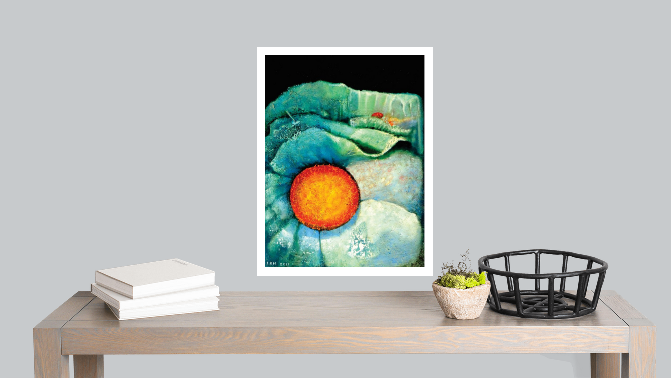 abstract floral painting with light aqua colors and orange center over a table with books plant and a bascket