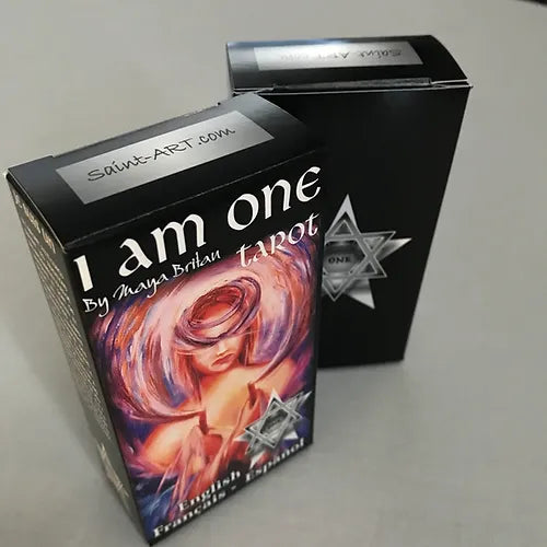Tarot card box titled 'I am one' by Maya Brittan with a black and white design on a gray background.